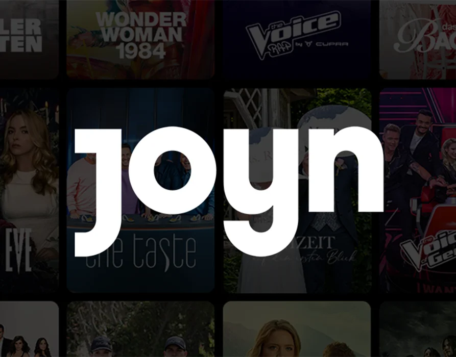 Joyn logo in the foreground. In the background, logos and images of ProSiebenSat.1 programmes. (Logo)